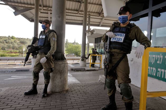 (200403) -- TEL AVIV, April 3, 2020 (Xinhua) -- Israeli soldiers wearing face masks are seen in the central Israeli city of Tel Aviv on April 2, 2020. Israel reported 765 new confirmed cases of COVID-19 on Thursday, the daily highest so far, bringing the total number to 6,857, said the Ministry of Health. (Gideon Markowicz JINI Handout via Xinhua) MIDEAST-TEL AVIV-COVID-19 