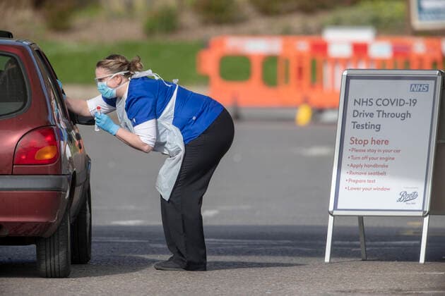 . 02 04 2020. Chessington, United Kingdom. National Health Service staff at work at a drive through Coronavirus Testing Centre in Chessington, United Kingdom.  xi-Imagesx IIM-20976-0014