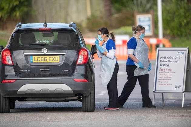 . 02 04 2020. Chessington, United Kingdom. National Health Service staff at work at a drive through Coronavirus Testing Centre in Chessington, United Kingdom.  xi-Imagesx IIM-20976-0016