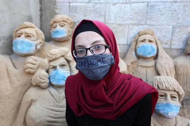 April 3, 2020, Gaza City, Gaza Strip, Palestinian Territory: A Palestinian artist Rana el-Ramlawi, 23, creates a sand sculpture stay home during awareness campaign about the spread of coronavirus disease (COVID-19), at her house Gaza city, on April 3, 2020. The United Nations has warned that a COVID-19 outbreak in Gaza could be disastrous, given the high poverty rates and weak health system in the coastal strip under Israeli blockade since 2007. Authorities in Gaza have said that more than 2,700 Palestinians are in home-isolation, mostly people who had returned from Egypt Gaza City Palestinian Territory - ZUMAap3_ 20200403_zaf_ap3_035 Copyright: xMahmoudxAjjourx