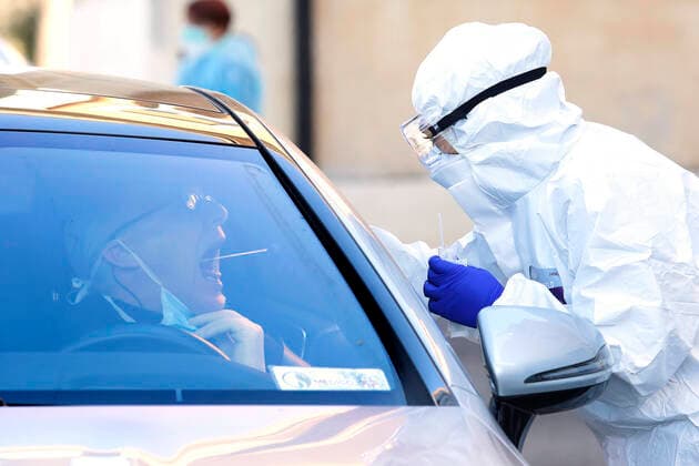 Rome April 4th 2020. Santa Maria della Pieta . Coronavirus emergency. Due to the spread of Covid-19 virus, Italy started a new procedure, a drive-through COVID-19 pharyngeal and nasal swab to test possible positivity to the infection . In the pictures, medical workers testing doctors and nurses of San Filippo Neri hospital. Photo Samantha Zucchi Insidefoto SamanthaxZucchi