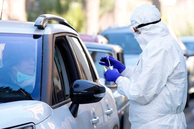 Rome April 4th 2020. Santa Maria della Pieta . Coronavirus emergency. Due to the spread of Covid-19 virus, Italy started a new procedure, a drive-through COVID-19 pharyngeal and nasal swab to test possible positivity to the infection . In the pictures, medical workers testing doctors and nurses of San Filippo Neri hospital. Photo Samantha Zucchi Insidefoto SamanthaxZucchi