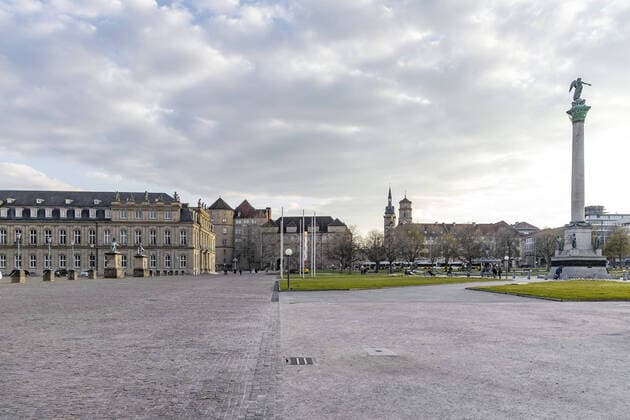 DEU, Germany, Baden Württemberg, Stuttgart, 03 04 2020 Palace Square Stuttgart empty of people From left New Palace, Old Palace, Collegiate Church, Jubilee Column Effects of the Corona Pandemic