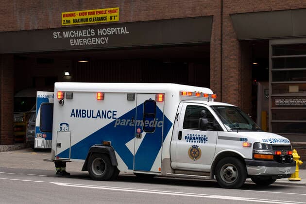 April 3, 2020: An ambulance parked in front of St. MichaelÃ¢â‚¬â ¢s Hospital in Toronto where numerous patients have tested positive for COVID-19. - ZUMAc232 20200403_zip_c232_005 Copyright: xGilesxCampbellx