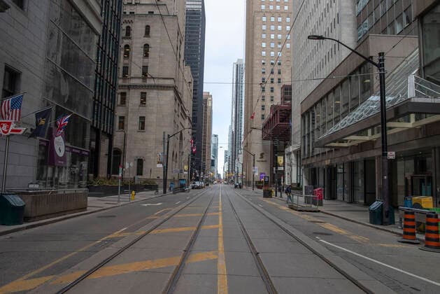 April 3, 2020: 9:58 am at the intersection of Yonge St. and King St. in Toronto. With the spread of COVID-19 growing in Canada, the downtown core is significantly quieter than usual. - ZUMAc232 20200403_zip_c232_008 Copyright: xGilesxCampbellx