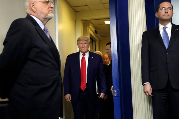 April 3, 2020, Washington, District of Columbia, USA: United States President Donald J. Trump arrives at a press briefing on the COVID-19 pandemic with members of the Coronavirus Task Force at the White House in Washington on April 3, 2020. At left is Director of the Centers for Disease Control and Prevention Dr. Robert Redfield and at right is US Secretary of Health and Human Services (HHS) Alex Azar Washington USA - ZUMAs152 20200403_zaa_s152_037 Copyright: xYurixGripasx