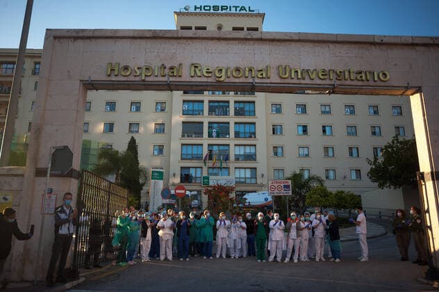 April 3, 2020, Malaga, Spain: Nurses and doctors of the Regional Hospital in downtown retuning the applause (which has become a custom every evening) to those that show gratitude towards during the fight against the Covid-19 virus outbreak..Spain is the first country in Europe with more than 110.000 people infected and almost 11.000 deaths around the country, according to National Health Service sources. Andalusia is the city with more people infected by the virus. Malaga Spain - ZUMAs197 20200403_zaa_s197_261 Copyright: xJesusxMeridax