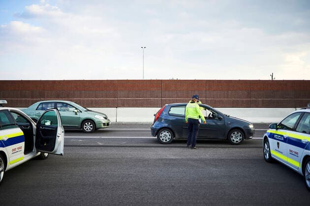 April 3, 2020, Vrhnika, Slovenia: Slovenian police officers control the traffic at one of the checkpoints 15 km west of Slovenian capital Ljubljana..Slovenian authorities implemented stricter travel ban rules to prevent citizens of one municipality to travel into another municipality, except for work or urgent matters, to prevent the spread of the coronavirus. Police controls are mostly set on roads, leading to popular tourists™ places. Authorities believe that sunny weather forecast could draw people out of their homes during the quarantine period and thus the coronavirus situation could worsen. Vrhnika Slovenia - ZUMAs197 20200403_zaa_s197_289 Copyright: xJurexMakovecx