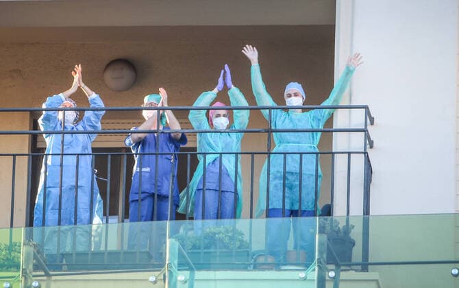 April 3, 2020: 3 April 2020 (Malaga ) All nurses and paramedics leave at 20 pm for their work in the fight against the Coronavirus health crisis outside the Malaga Regional Hospital.Police and ambulances joined the event. - ZUMAc161 20200403_zap_c161_002 Copyright: xLorenzoxCarnerox
