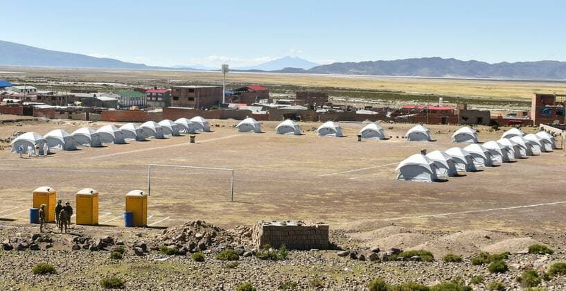 Acting Defense Minister Luis Fernando Lopez (3R) conducts an inspection at the first military camp to host hundreds of Bolivians, who were seeking to return from that neighboring country and who have not been able to do so far due to the closure of borders within the quarantine by COVID-19, in Pisiga, Bolivia, 03 April 2020. EFE Emilio Huascar Castillo A military camp awaits hundreds of Bolivians repatriated from Chile !ACHTUNG: NUR REDAKTIONELLE NUTZUNG!  Copyright: xEMILIOxHUASCARxCASTILLOx AME055 20200404-637215593729516531