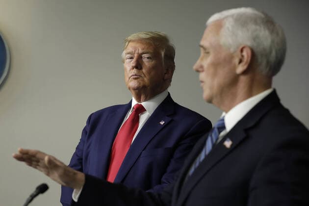 U.S. President Donald Trump listens to Vice President Mike Pence speaking at a press briefing on the COVID-19 pandemic with members of the Coronavirus Task Force at the White House in Washington, DC on Friday, April 3, 2020.  WAX20200403216 YURIxGRIPAS