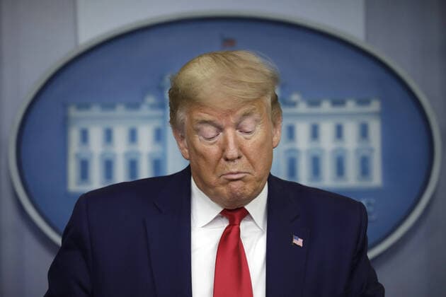 U.S. President Donald Trump reacts during a press briefing on the COVID-19 pandemic with members of the Coronavirus Task Force at the White House in Washington, DC on Friday, April 3, 2020.  WAX20200403237 YURIxGRIPAS