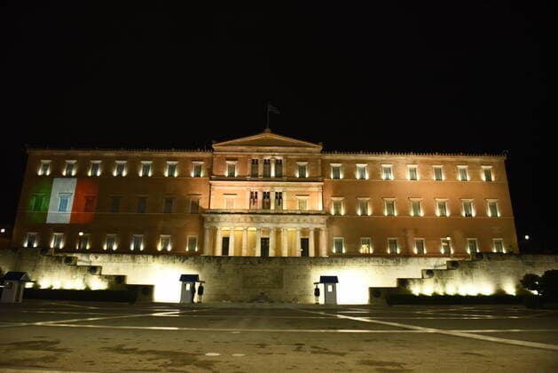Greece: Indication of support for Italy amid COVID-19 Greek parliament was dressed in the colors of Italy, as a sign of support, cause of Covid-19. Athens Attiki Greece Copyright: DimitriosxKarvountzis