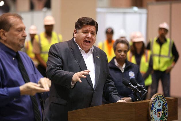 April 3, 2020, Chicago, IL, USA: Illinois Gov. J.B. Pritzker speaks during a news conference in Hall C Unit 1 of the COVID-19 alternate site at McCormick Place in Chicago on Friday, April 3, 2020. Hall C will house 500 beds. Chicago USA - ZUMAm67_ 20200403_zaf_m67_031 Copyright: xChrisxSwedax