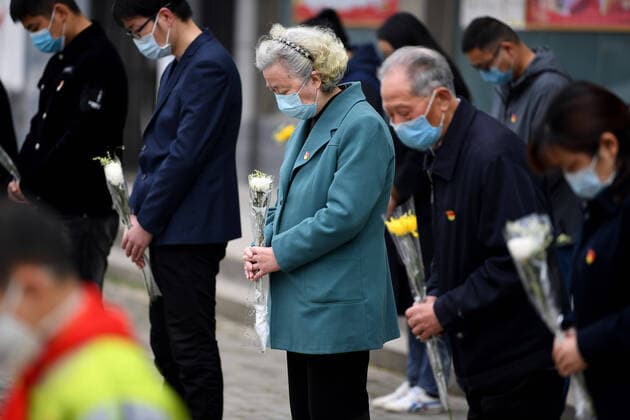 (200404) -- FEIXI, April 4, 2020 -- People pay a silent tribute to martyrs who died in the fight against the novel coronavirus disease (COVID-19) outbreak and compatriots who died of the disease in Feixi, east China s Anhui Province, April 4, 2020. ) CHINA-COVID-19 VICTIMS-NATIONAL MOURNING-SILENT TRIBUTE (CN) LiuxJunxi 