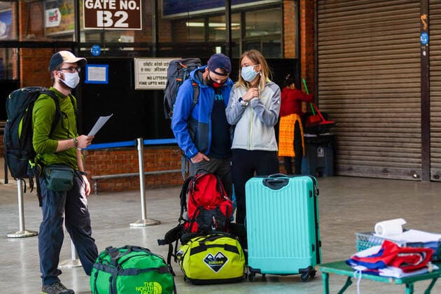 April 4, 2020, Kathmandu, Nepal: Tourists from France stranded while wearing protective masks as await for a flight back to home at Tribhuvan International Airport amid Coronavirus threat..European countries including Germany and France are taking back more than 600 citizens stranded in Nepal toady. Kathmandu Nepal - ZUMAs197 20200404_zaa_s197_021 Copyright: xPrabinxRanabhatx
