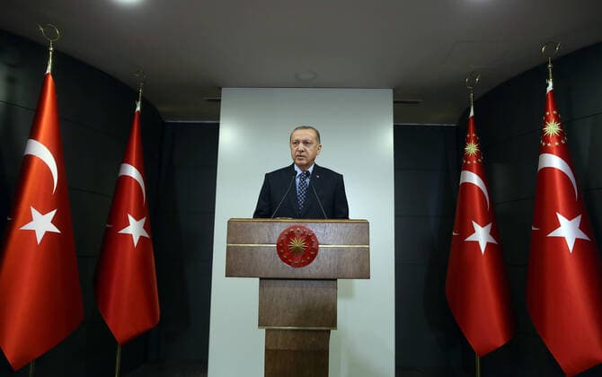(200404) -- ISTANBUL, April 4, 2020 -- Turkish President Recep Tayyip Erdogan delivers a televised address to the nation in Istanbul, Turkey, April 3. Turkish President Recep Tayyip Erdogan on Friday declared a partial curfew for the citizens under the age of 20 to curb the fast spread of COVID-19. At a televised address to the nation, Erdogan announced a series of new measures to contain the coronavirus outbreak as the death toll from the virus climbed to 425, and the confirmed cases totaled 20,921 on Friday. (Photo by Mustafa Kaya Xinhua) TURKEY-ISTANBUL-COVID-19-PARTIAL CURFEW MuxSitafa¡¤kaya 