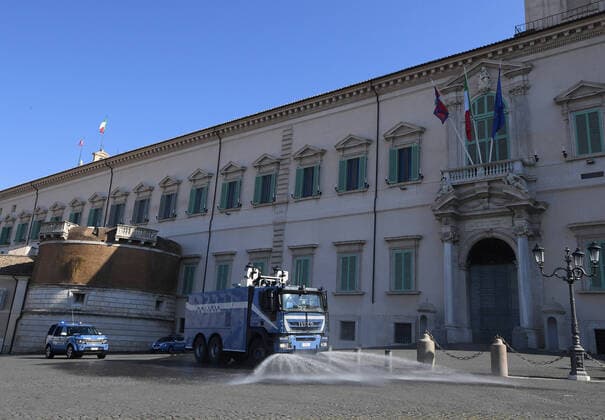 (200404) -- ROME, April 4, 2020 -- Police clean the ground in front of the Quirinale Presidential Palace in Rome, Italy, April 4, 2020. The coronavirus pandemic has claimed 14,681 lives in locked-down Italy. The number of confirmed infections, fatalities and recoveries totaled 119,827 on Friday, the country s Civil Protection Department managing the national emergency response said on Friday. (Photo by Alberto Lingria Xinhua) ITALY-ROME-COVID-19 ChengxTingting 