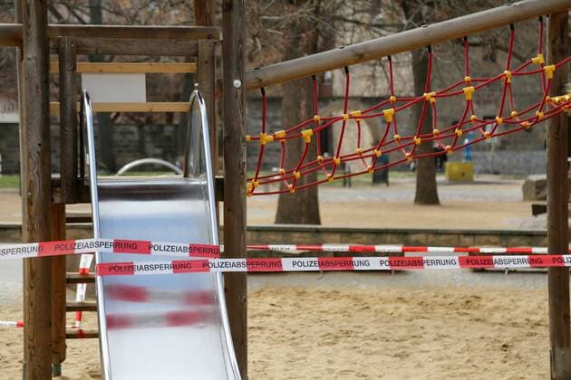Corona 04 04 2020 , Erfurt, the city center is because of the Corona crisis as extinct, people should stay at home as best they can, stay in the picture playground equipment is wrapped with police tape all playgrounds are closed due to the pandemic