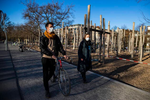 Ben and his elderly mother Elsa walk and talk with face mask at Gleisdreieckpark in Berlin on 4 April 2020 To slow the spread of the coronavirus SARS CoV 2, the federal and state governments decided to impose further restrictions