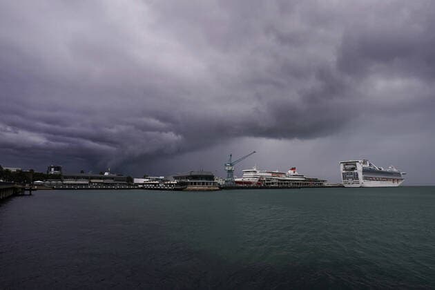 AUSTRALIA CORONAVIRUS COVID-19, Storm Clouds hover Port Melbourne harbour where the Spirit Of Tasmania Ferry and the Golden Princess Cruise Ship remained docked due to the coronavuris (COVID-19) pandemic in Melbourne, Sunday, April 5, 2020. ( NO ARCHIVING, EDITORIAL USE ONLY, NO USE IN BOOKS WITHOUT CONSENT MELBOURNE VIC AUSTRALIA  Copyright: xMICHAELxDODGEx 20200405001461860456