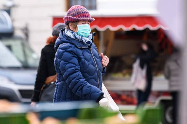 (200405) -- LEIPZIG, April 5, 2020 -- A woman wearing a face mask is seen at a market in Leipzig, eastern Germany, April 4, 2020. More than 89,300 COVID-19 cases and at least 1,250 deaths have been registered as of Saturday afternoon across Germany, according to evaluations of the German Press Agency (DPA) which took into account the latest figures from all federal states. (Photo by Xinhua) GERMANY-LEIPZIG-COVID-19-CASES KevinxVoigt 