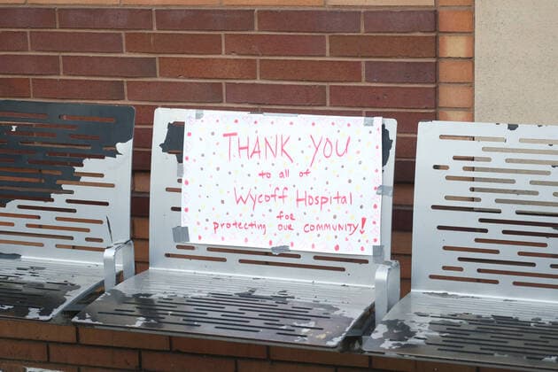 April 4, 2020, New York City, NY, United States: Wyckoff Heights Medical Center is filled with COVID-19 or novel Coronavirus patients. A Thank You sign is taped to a bench outside the hospital. New York City United States - ZUMAh16_ 20200404_zaf_h16_030 Copyright: xDanxHerrickx