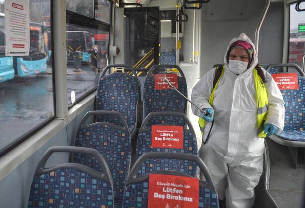 (200405) -- ISTANBUL, April 5, 2020 (Xinhua) -- A staff member disinfects a bus in Istanbul, Turkey, April 4, 2020. Turkey reported 3,013 more coronavirus cases and 76 new deaths on Saturday, bringing the tally of infections to 23,934 and the death toll to 501. (Xinhua) TURKEY-ISTANBUL-COVID-19-CASES 