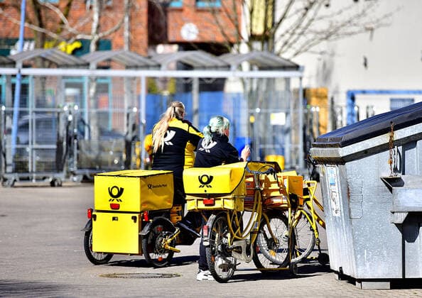 Oranienburg Covid 19,Corona,Virus,Coronavirus,Corona crisis,crisis, shut down,Corona crisis,delivery base,car,postbus,scooter,letters ,deliverer ,car ,provider,company,postman,yellow,post van ,delivery,delivery van,mail carrier,postman, group,DHL,Deutsche Post,company logo,symbol ,lettering,outdoor,outside,logo,lo Copyright: xEibnerxPressefotox xDanielxLakomskix EP_dli