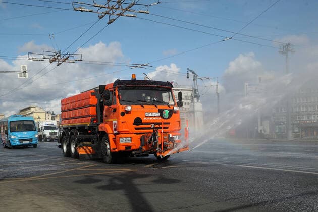 MOSCOW, RUSSIA - APRIL 5, 2020: A street sweeper washes with disinfectant the road in Tverskaya Zastava Square as part of preventive measures against the spread of the COVID-19 infection, according to the Russian Federal Service for Consumer Protection and Welfare Supervision (Rospotrebnadzor), there are 3,893 residents diagnosed with COVID-19 in Moscow. Mikhail Tereshchenko TASS  TS0D4742