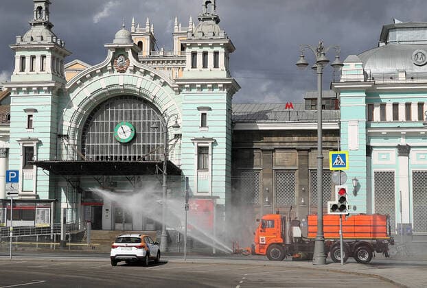 MOSCOW, RUSSIA - APRIL 5, 2020: A street sweeper washes the roads with disinfectant in Tverskaya Zastava Square as part of preventive measures against the spread of the COVID-19 infection; according to the Russian Federal Service for Consumer Protection and Welfare Supervision (Rospotrebnadzor), there are 3,893 residents diagnosed with COVID-19 in Moscow. Mikhail Tereshchenko TASS  TS0D4774
