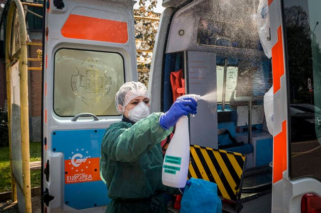 Milan. Green Cross volunteers and health workers intervene with the 118 emergency calls on the cases of COVID19 coronavirus preparation and transport to hospital. In the photo the sanctification of the ambulance that is carried out after each intervention (Carlo Cozzoli Fotogramma, Milan - 2020-04-05) p.s. la foto e utilizzabile nel rispetto del contesto in cui e stata scattata, e senza intento diffamatorio del decoro delle persone rappresentate  Copyright: xCarloxCozzolix xFOTOGRAMMAx