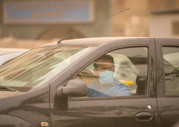 (200405) -- CAIRO, April 5, 2020 -- A driver wearing a mask is seen on a street in Cairo, Egypt, April 5, 2020. Egypt on Saturday reported five new deaths from the COVID-19 infection, bringing the pandemic fatalities in the country to 71. ) EGYPT-CAIRO-COVID-19-DAILY LIFE WuxHuiwo 