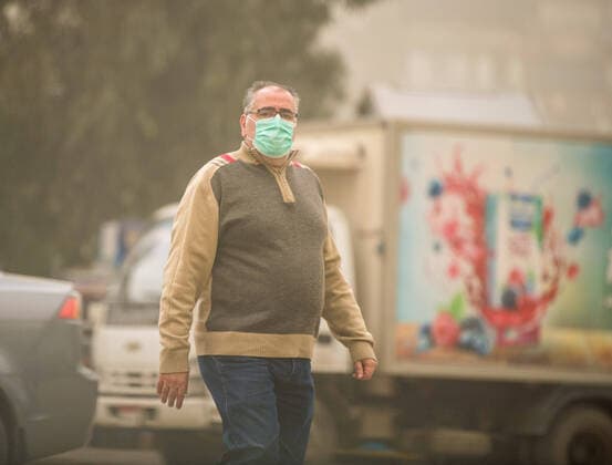 (200405) -- CAIRO, April 5, 2020 -- A pedestrian wearing a mask walks on a street in Cairo, Egypt, April 5, 2020. Egypt on Saturday reported five new deaths from the COVID-19 infection, bringing the pandemic fatalities in the country to 71. ) EGYPT-CAIRO-COVID-19-DAILY LIFE WuxHuiwo 