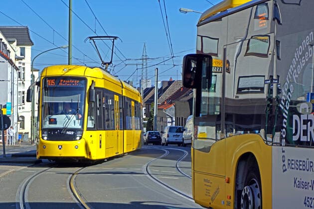 Buses and trams in the Ruhr area Buses and trams travel to the Essen transport hub at Fliegenbusch Essen North Rhine-Westphalia Germany Fliegenbusch