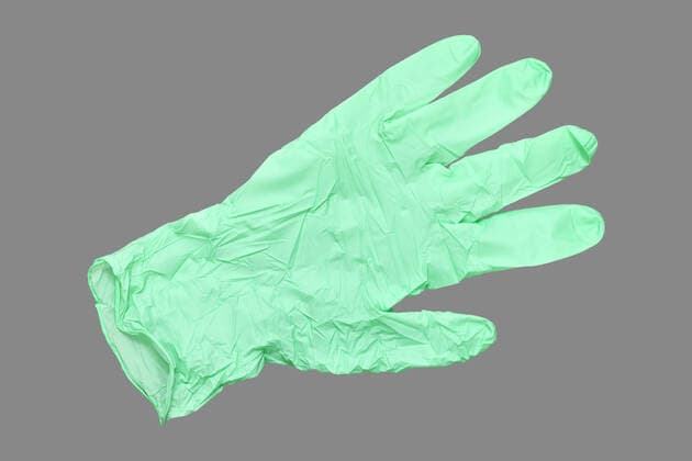 Protective glove, clipping, symbol photo Coronavirus crisis ** NUR FUER REDAKTIONELLE ZWECKE ** EDITORIAL USE ONLY **