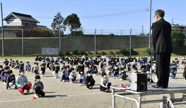 New coronavirus Pupils attend a ceremony marking the start of the new school year held outdoors at an elementary school in Mito in Ibaraki Prefecture, eastern Japan, on April 6, 2020. Elementary and high schools had been closed in Japan since early March due to the coronavirus outbreak. 
