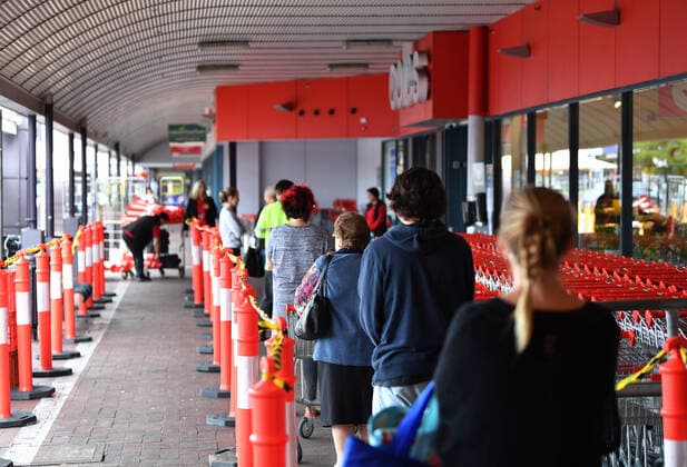 AUSTRALIA CORONAVIRUS COVID-19, Shoppers are seen waiting outside a Coles supermarket at Firle in Adelaide, Monday, April 6, 2020. The Australian Government has announced even tighter restrictions around social gatherings, and boosted stimulus spending, in attempts to fight off the coronavirus and it s affects on the economy. ( NO ARCHIVING, EDITORIAL USE ONLY, NO USE IN BOOKS WITHOUT CONSENT ADELAIDE SA AUSTRALIA  Copyright: xDAVIDxMARIUZx 20200406001461983055