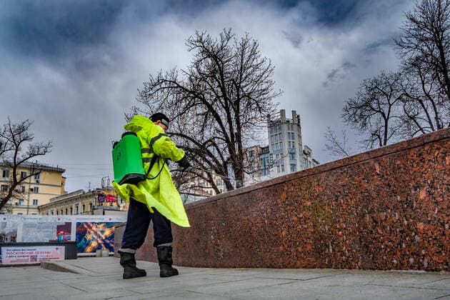 April 5, 2020. Russia. Moscow on coronavirus lockdown. A utility worker washes a pedestrian underpass with disinfectant. Moscow authorities imposed home isolation for all Moscow residents, regardless of their age, and restrictions on movement within the city, effective since March 30, 2020, as a measure to contain the spread of the COVID-19 coronavirus infection. Violations of the stay-at-home order carry fines ranging from 1,000 to 40,000 rubles for non-infected people, and up to 1m rubles or imprisonment for up to 3 years for infected people, depending on the severity of consequences. KonstantinxKokoshkin