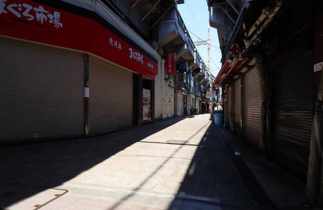 April 6, 2020, Tokyo, Japan - A few people walk at the Ameyoko street in Tokyo on Monday, April 6, 2020. Japanese Prime Minister Shinzo Abe is expecting to declare a state of emergency over the coronavirus in Japan.  (125086252)