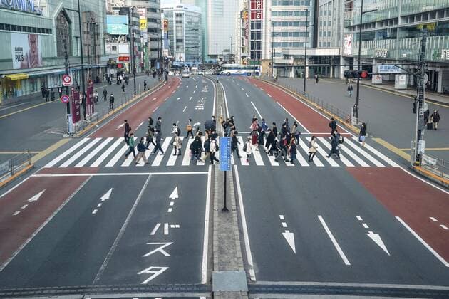 New coronavirus Fewer people than usual walk in Tokyo s Shinjuku area on April 6, 2020, amid growing concerns over the new coronavirus. 