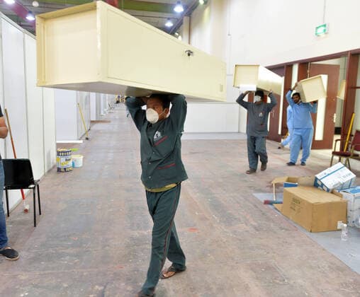 (200406) -- HAWALLI GOVERNORATE, April 6, 2020 (Xinhua) -- Workers carry lockers in a new quarantine center in Hawalli Governorate, Kuwait, April 6, 2020. Kuwaiti government set up on Monday a new quaratine center in Hawalli Governorate. (Photo by Asad Xinhua) KUWAIT-HAWALLI GOVERNORATE-COVID-19-NEW QUARANTINE CENTER 