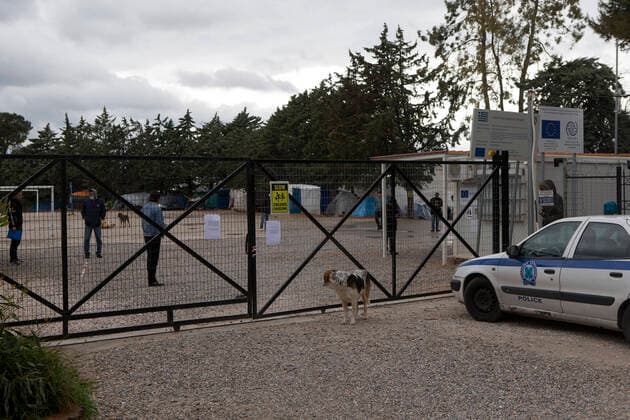 (200406) -- MALAKASA, April 6, 2020 -- A police car is parked at the Malakasa camp near Athens, Greece, April 6, 2020. An Afghan migrant in Malakasa was confirmed to be infected with COVID-19 on Sunday, and the camp has been locked down since then. ) GREECE-MALAKASA-MIGRANTS-CAMP-COVID-19 MariosxLolos 