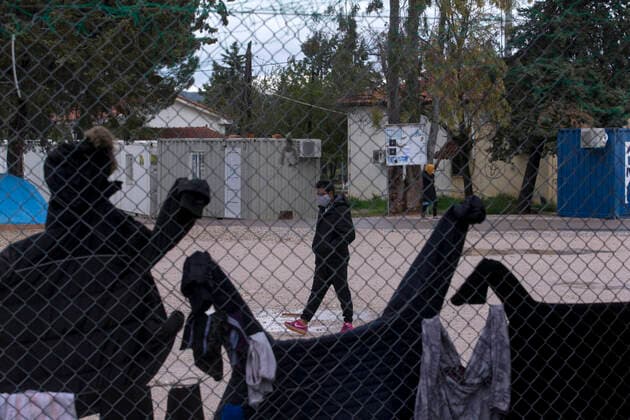(200406) -- MALAKASA, April 6, 2020 -- A man walks at the Malakasa camp near Athens, Greece, April 6, 2020. An Afghan migrant in Malakasa was confirmed to be infected with COVID-19 on Sunday, and the camp has been locked down since then. ) GREECE-MALAKASA-MIGRANTS-CAMP-COVID-19 MariosxLolos 