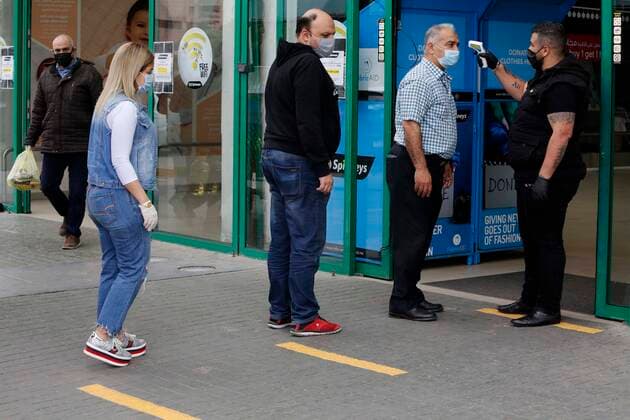 May 7, 2020, Beirut, Beirut, Lebanon: Lebanese man wearing a mask uses a temperature test machine for a medical examination to detect Coronavirus, in Beirut, Lebanon, on April 6, 2020 Beirut Lebanon - ZUMAap3_ 20200507_zaf_ap3_003 Copyright: xMarwanxTahtahx
