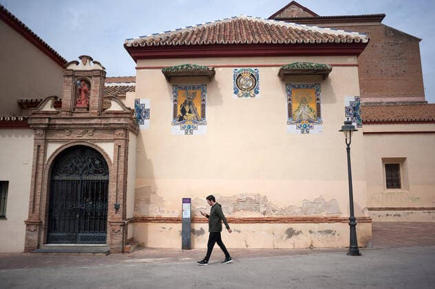 April 6, 2020, Malaga, Spain: A man walks past an empty church during a Holy Monday in downtown Malaga..The traditional Easter celebration has been cancelled in Spain. Believers live an unusual Holy Week in their homes, for that reason many people decorate their balconies or place decorative statues of Christ in their shops and stores. After the alarm state and lockdown in the country by COVID-19 coronavirus all people are enclosed in their homes following the confinement decreed by the Spanish government and which will be extended for more 15 days until 26 April. Malaga Spain - ZUMAs197 20200406_zaa_s197_033 Copyright: xJesusxMeridax