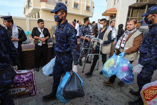 April 6, 2020, Khan Younis, Gaza Strip, Palestinian Territory: Palestinians who were quarantined leave the quarantine centers, after the end of the quarantine period in the center of Muscat in Khan Younis in the southern of Gaza strip, April 6, 2020 Khan Younis Palestinian Territory - ZUMAap3_ 20200406_zaf_ap3_107 Copyright: xAshrafxAmrax