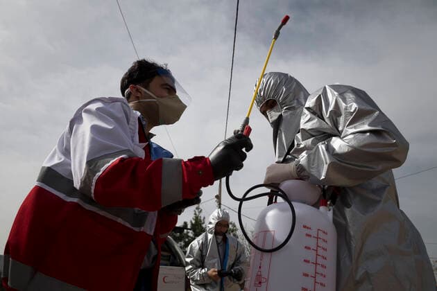 April 6, 2020, Tehran, Iran: Members of the Iranian Red Crescent s Volunteers Organization wearing face masks and protective suit attend the Hameh Sin (Torkaman) mountain village for sanitizing and screening villagers who may be infected by the novel coronavirus (COVID-19) disease in eastern Tehran, Iran. Media reported that Iran is one of the most affected by pandemic COVID-19 disease caused by the SARS-CoV-2 coronavirus. According to the latest reports by the Iranian Ministry of Health, over 3,700 people have died from the coronavirus infection throughout the country. Tehran Iran - ZUMAf146 20200406_zip_f146_015 Copyright: xRouzbehxFouladix