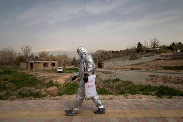 April 6, 2020, Tehran, Iran: Members of the Iranian Red Crescent s Volunteers Organization wearing face masks and protective suit attend the Hameh Sin (Torkaman) mountain village for sanitizing and screening villagers who may be infected by the novel coronavirus (COVID-19) disease in eastern Tehran, Iran. Media reported that Iran is one of the most affected by pandemic COVID-19 disease caused by the SARS-CoV-2 coronavirus. According to the latest reports by the Iranian Ministry of Health, over 3,700 people have died from the coronavirus infection throughout the country. Tehran Iran - ZUMAf146 20200406_zip_f146_029 Copyright: xRouzbehxFouladix