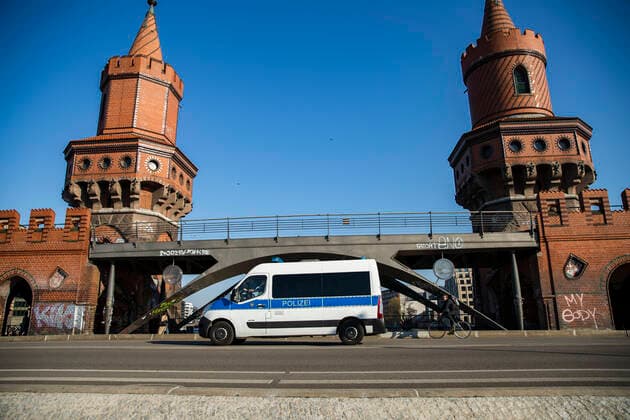 A police car on the Oberbaumbruecke in Berlin on April 6, 2020 In order to slow down the spread of the coronavirus SARS CoV 2, the federal and state governments decided on further restrictions After museums, theatres, sports events etc. were banned, further tightened measures have b